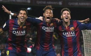Barcelona's Luis Suarez, Neymar and Lionel Messi celebrate a goal against Atletico Madrid during their Spanish First Division soccer match at Camp Nou stadium in Barcelona